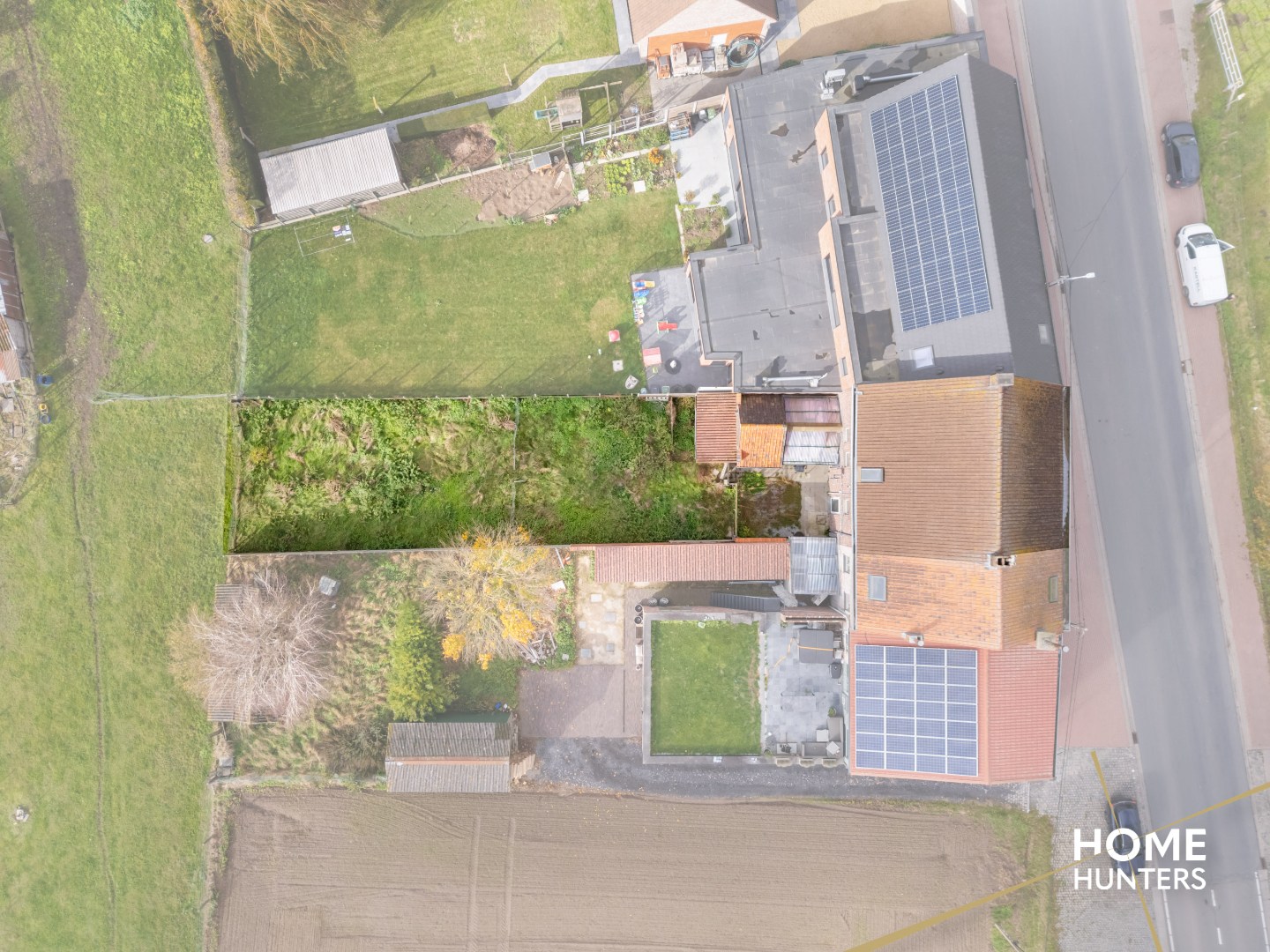 Renovatieproject met 4 slaapkamers, garage en ruime tuin - foto 2