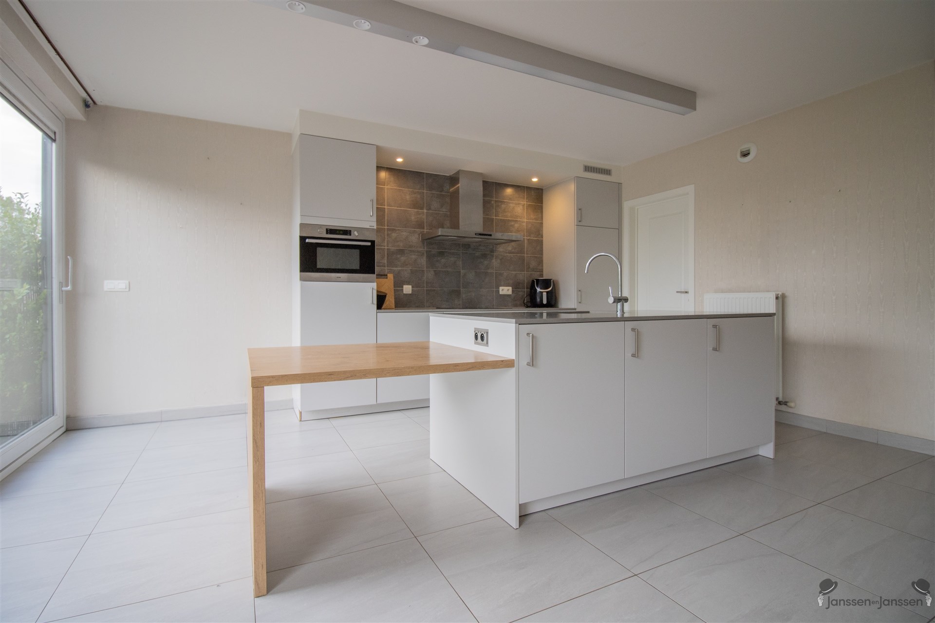 Gelijkvloers appartement van 114 m² met 2 slaapkamers en privé tuin - foto 4