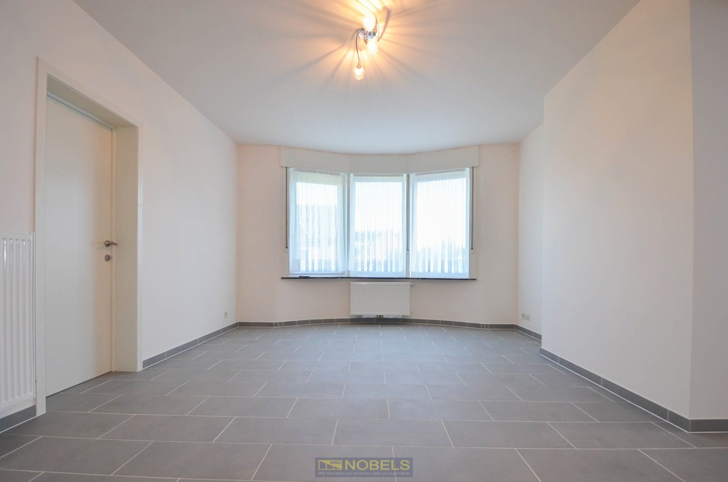 Te koop, gerenoveerde opbrengsteigendom met 2 verhuurde appartementen, gezellige tuin en 2 garages te Oudenaarde - photo 3