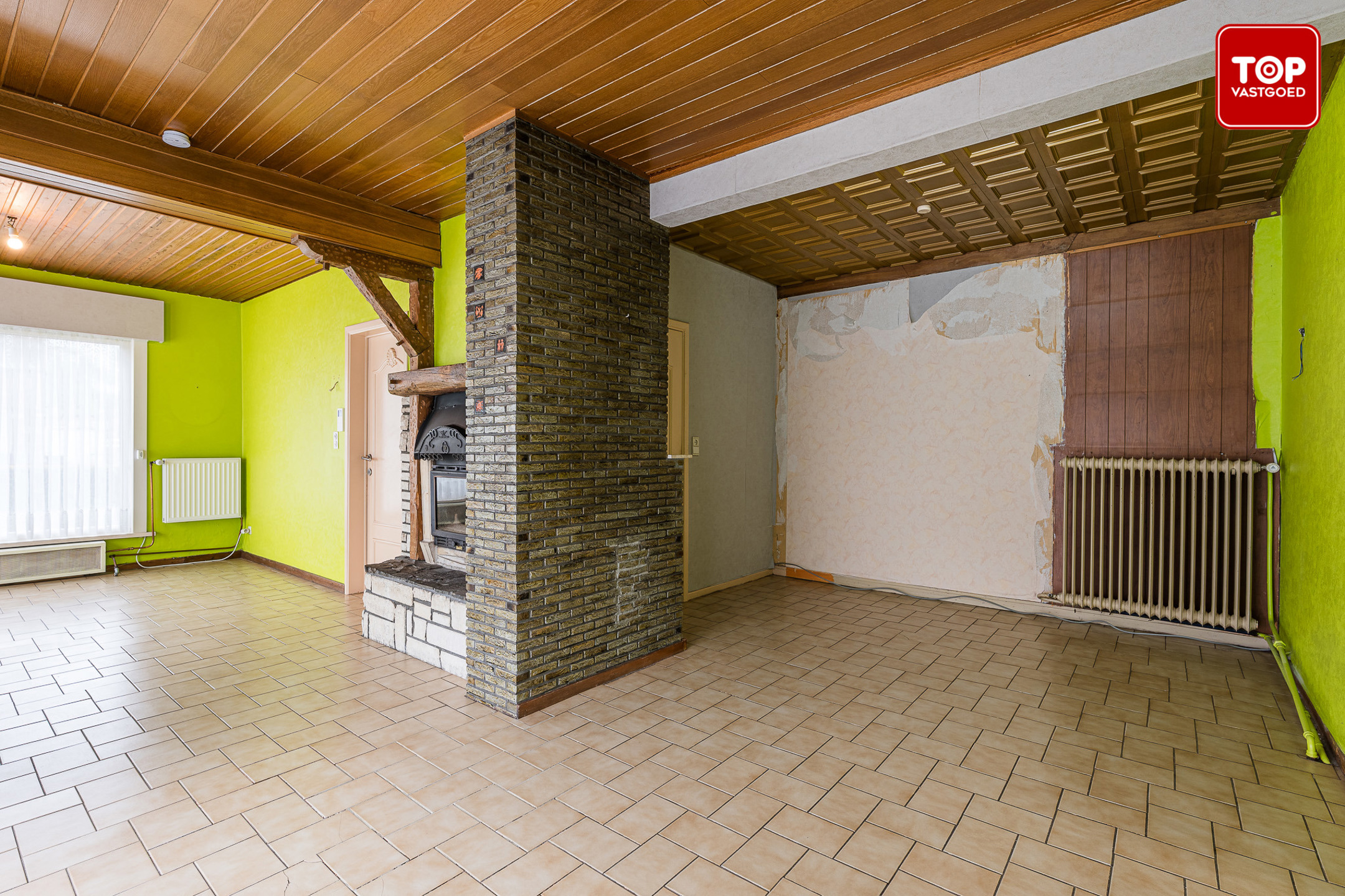 Op te frissen half open bebouwing met 3 slaapkamers, tuin en garage.  - foto 5