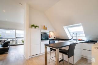 Layout:Entrance hall with guest toilet and access to the living area with a sitting and dining corner. Thanks to the large sliding window, the space...