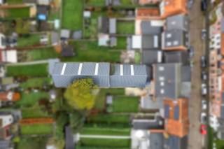 <p>Centrally located in Maria-ter-Heide, close to Bredabaan and driveway E19.</p><p>On the street side provided with a common entrance gate  (bxh approx. 2,89x2,00m) and driveway to warehouse.<br />First section approx. 8,30x13,40m, currently equipped with maneuvering space and 4 parking spaces. Second section accessible through an automatic gate. This part has an area of approx. 8,40mx19,70m, also furnished with parking spaces.<br />Full upper floor shell on concrete floor with visible roof structure, ideal for further finishing/furnishing.</p><p>Extras:<br />- approved electrical system with outlets for trickle chargers.<br />- renewed roof<br />- renewed exterior joinery<br />- no heating or access stairs to upper floor<br />- parking spaces rented at 75eur/month (partial)</p><p>Info/visit: 03/283 83 00 - noord@sinjoor.be</p>