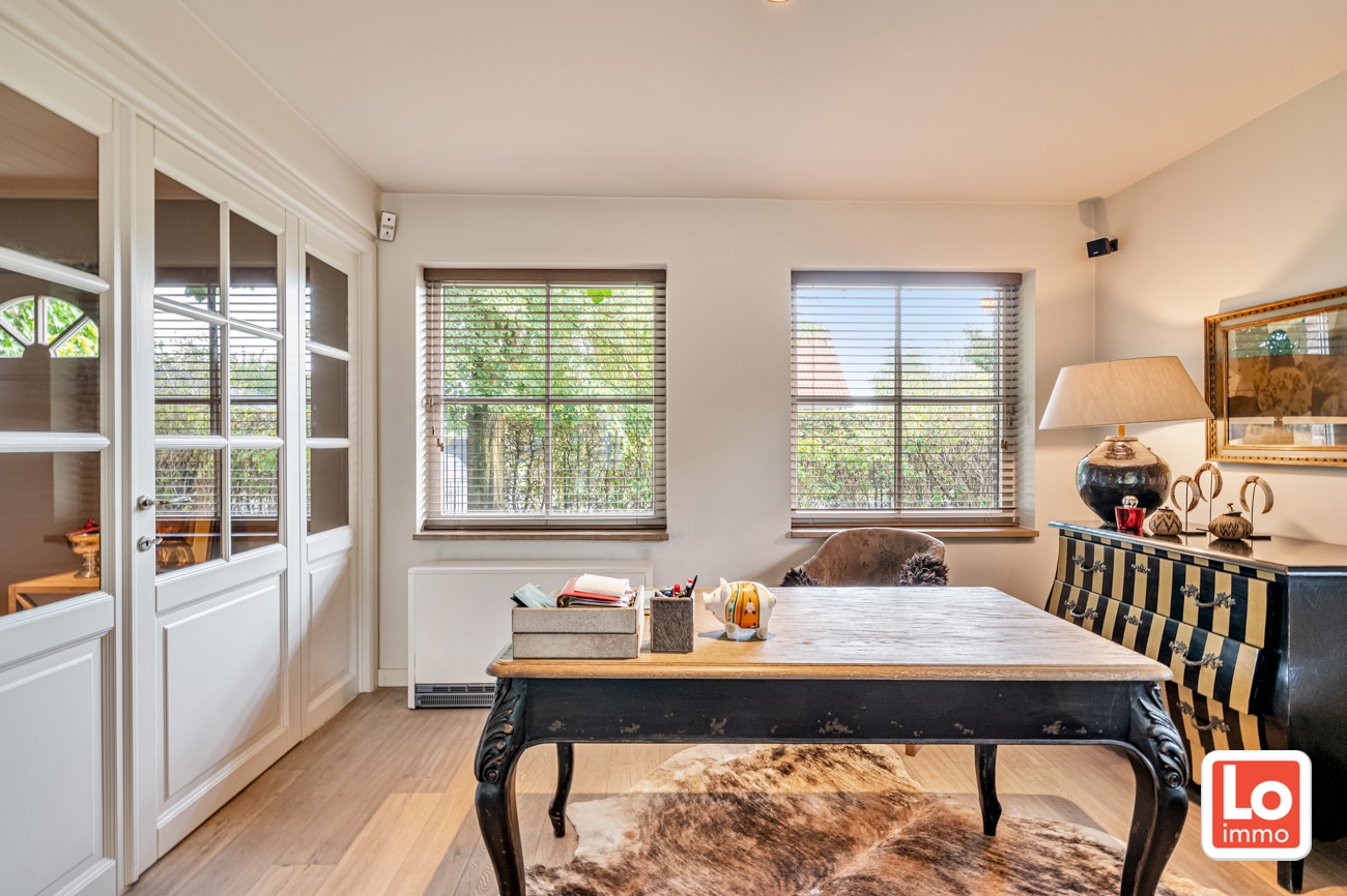 VERKOCHT! Charmante alleenstaande woning met inpandige garage en grote tuin op een rustige, groene locatie nabij het centrum van Beervelde! - foto 5