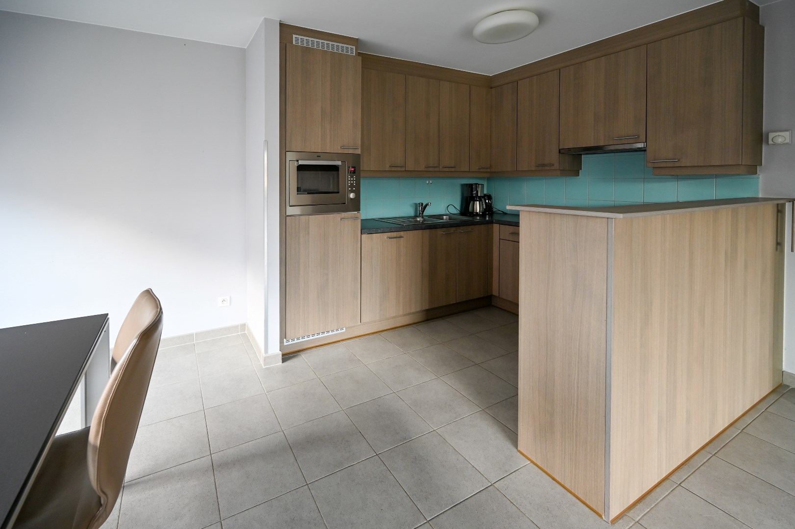 Gelijkvloers appartement met 1 slaapkamer, compact comfort aan zee - foto 4