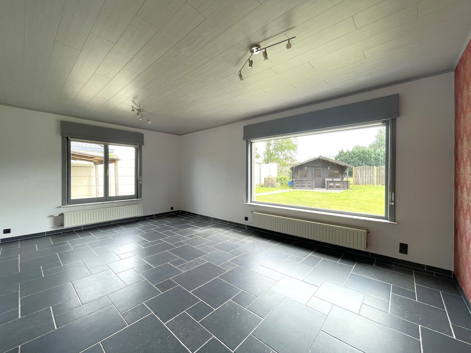 GELIJKVLOERSWONING MET 3 SLPK EN ZUIDTUIN OP RUSTIGE LOCATIE - foto 5