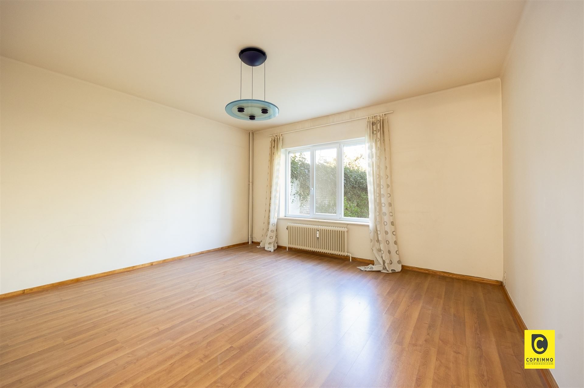 Charmant gelijkvloers appartement met tuin! - foto 5