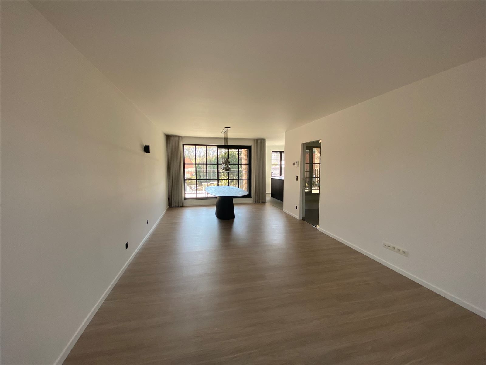 Stijlvol duplex appartement met autostaanplaats - foto 4