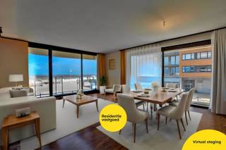 Op te frissen 2-slaapkamerappartement (84m²) met FRONTAAL & LATERAAL ZEEZICHT en 2 TERRASSEN op de kleine Esplanade / zeedijk te De Panne...