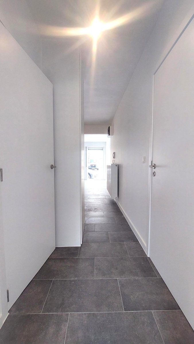 Instapklaar gelijkvloers appartement met 1 grote slaapkamer en gemeenschappelijke tuin - photo 4