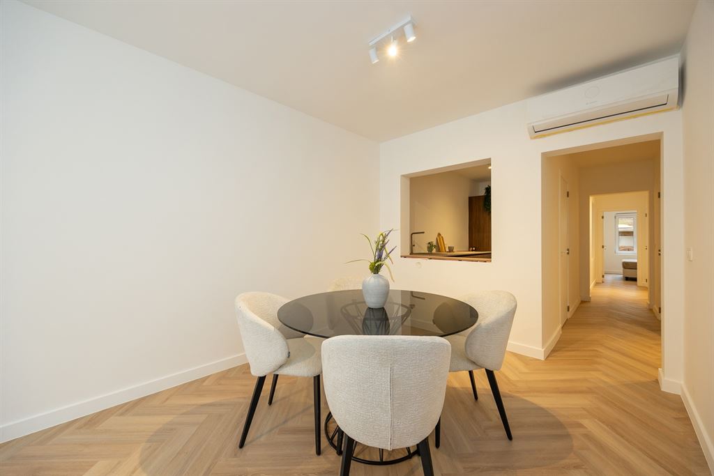 Gerenoveerd gelijkvloers appartement met grote tuin - foto 4