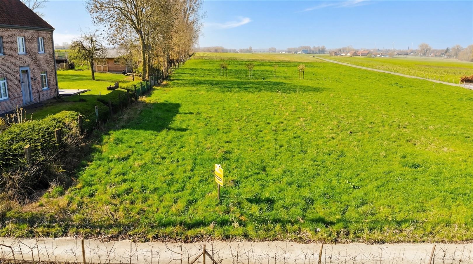 1342 m² zonovergoten bouwgrond met landelijk zicht - foto 3
