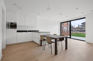 Recent en energiezuinig gelijkvloers éénslaapkamerappartement met terras, tuintje en ondergrondse staanplaats, rustig gelegen in Wuustwezel,...