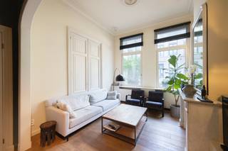 <div>
<ol>
<li>
<p>Located in the highly desirable Zurenborg neighbourhood, this charming, move-in-ready townhouse combines character, generous living space and modern-day comfort.</p>
<p>On the ground floor, three elegant reception rooms flow seamlessly into one another, comprising a stylish living room, a cosy library and a spacious dining room with an open-plan kitchen. This appealing layout creates a wonderful sense of space and provides the perfect setting for both relaxed family living and entertaining guests.</p>
<p>At the rear of the property, the generous south-west-facing garden is the perfect place to enjoy the afternoon and evening sunshine. An inviting outdoor space in which to unwind in privacy or make the most of long summer evenings.</p>
<p>The upper floors offer no fewer than five bedrooms and two bathrooms, providing ample space for family life, a home office or a dedicated hobby room.</p>
<p>With its generous proportions, pleasant natural light, sunny garden and prime location in the much-loved Zurenborg neighbourhood, this townhouse is an appealing choice for those seeking space, character and comfort in one of Antwerp’s most desirable residential areas.</p>
<p><strong>A characterful townhouse, ready to welcome its new owners.</strong></p>
</li>
</ol>
</div>
<div>
<ol>
<li>
<p>Located in the highly desirable Zurenborg neighbourhood, this charming, move-in-ready townhouse combines character, generous living space and modern-day comfort.</p>
<p>On the ground floor, three elegant reception rooms flow seamlessly into one another, comprising a stylish living room, a cosy library and a spacious dining room with an open-plan kitchen. This appealing layout creates a wonderful sense of space and provides the perfect setting for both relaxed family living and entertaining guests.</p>
<p>At the rear of the property, the generous south-west-facing garden is the perfect place to enjoy the afternoon and evening sunshine. An inviting outdoor space in which to unwind in privacy or make the most of long summer evenings.</p>
<p>The upper floors offer no fewer than 6 bedrooms and two bathrooms, providing ample space for family life, a home office or a dedicated hobby room.</p>
<p>With its generous proportions, pleasant natural light, sunny garden and prime location in the much-loved Zurenborg neighbourhood, this townhouse is an appealing choice for those seeking space, character and comfort in one of Antwerp’s most desirable residential areas.</p>
<p><strong>A characterful townhouse, ready to welcome its new owners.</strong></p>
</li>
</ol>
</div>