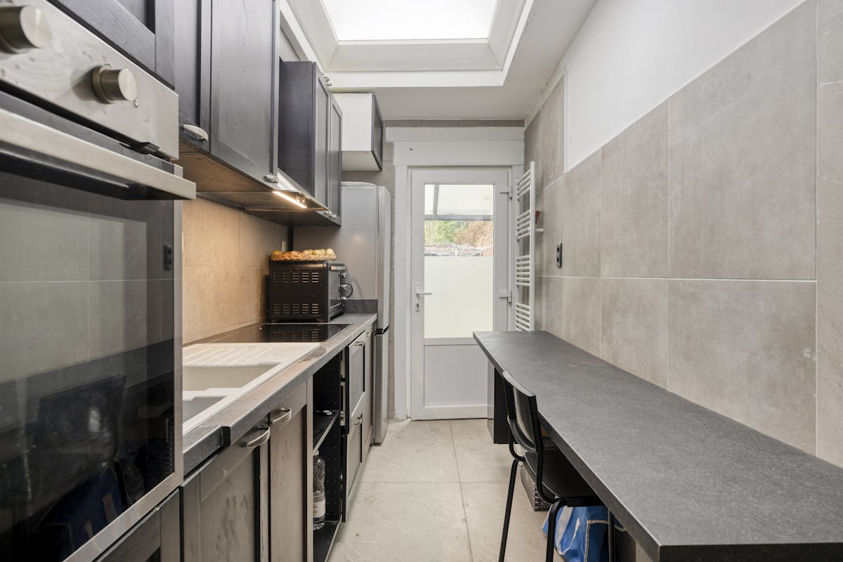 Gelijkvloersappartement met 1 slaapkamer en tuin te koop in Hoboken - foto 5