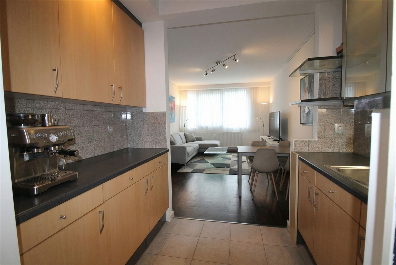 Gelijkvloers appartement met garagepl. en tuin - foto 4