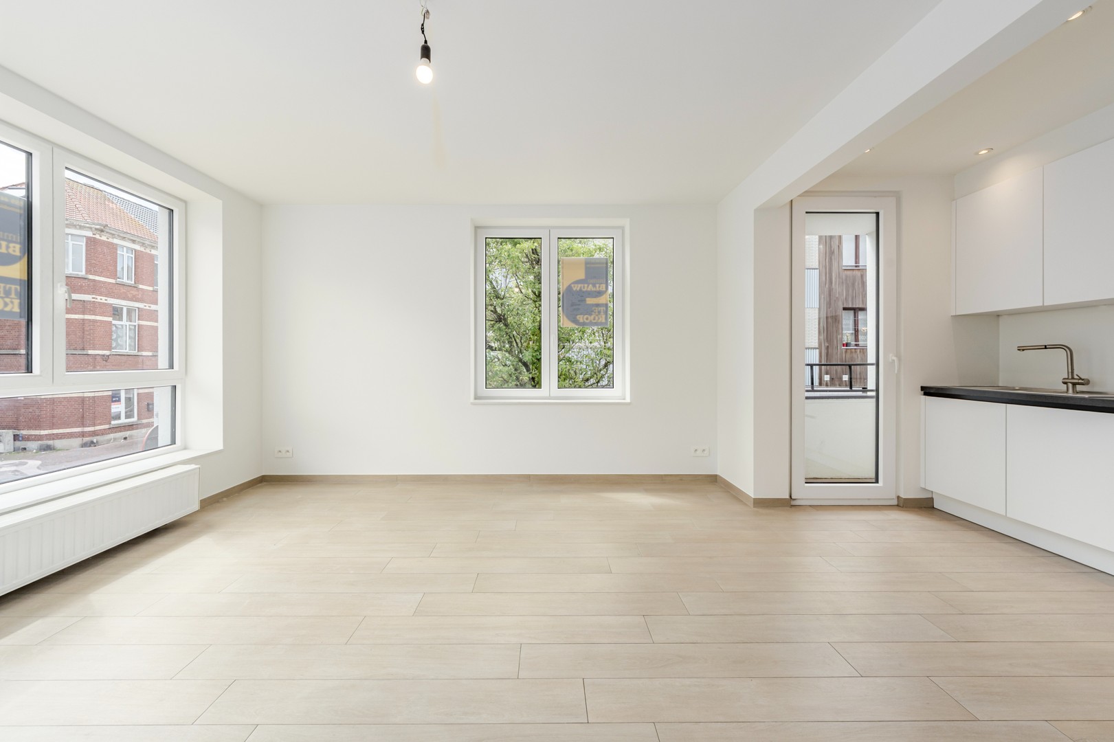 Lichtrijk en instapklaar hoekappartement in volledig vernieuwde residentie - foto 4