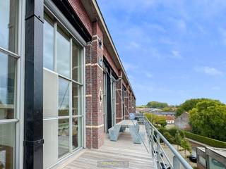 EXCLUSIEVE LOFT met  maar liefst 3 SLAAPKAMERS, 2 BADKAMERS en een HOGE AFWERKINGSGRAAD, gelegen nabij het CENTRUM van OUDENAARDE. De afwerking...