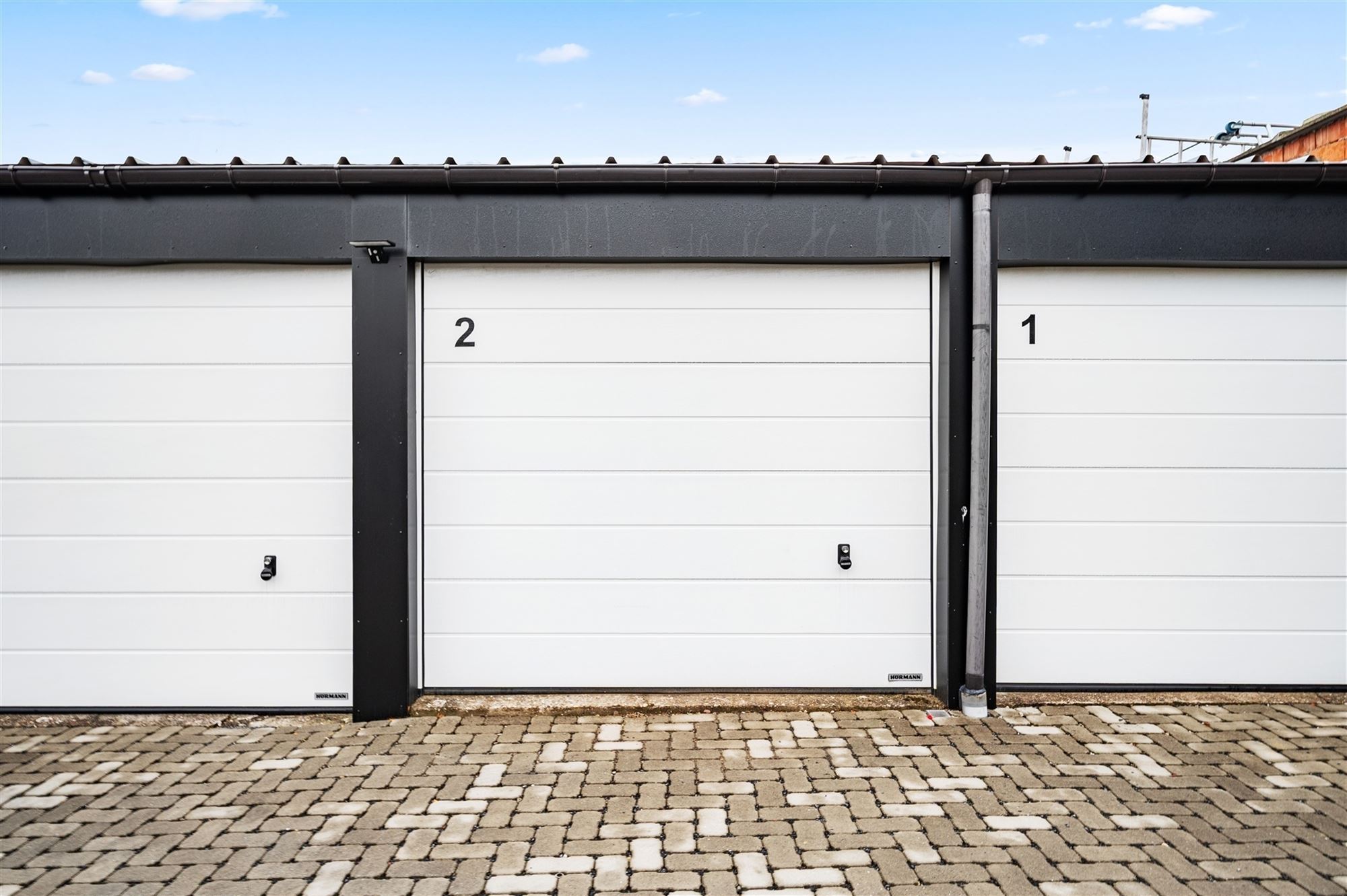 Opbrengsteigendom met ±4% rendement – 6 verhuurde garages - foto 5