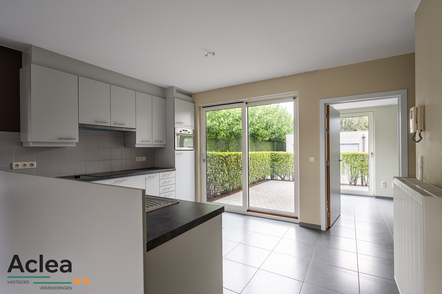 Ruim lichtrijk gelijkvloers appartement met 2 terrassen en garage - foto 5