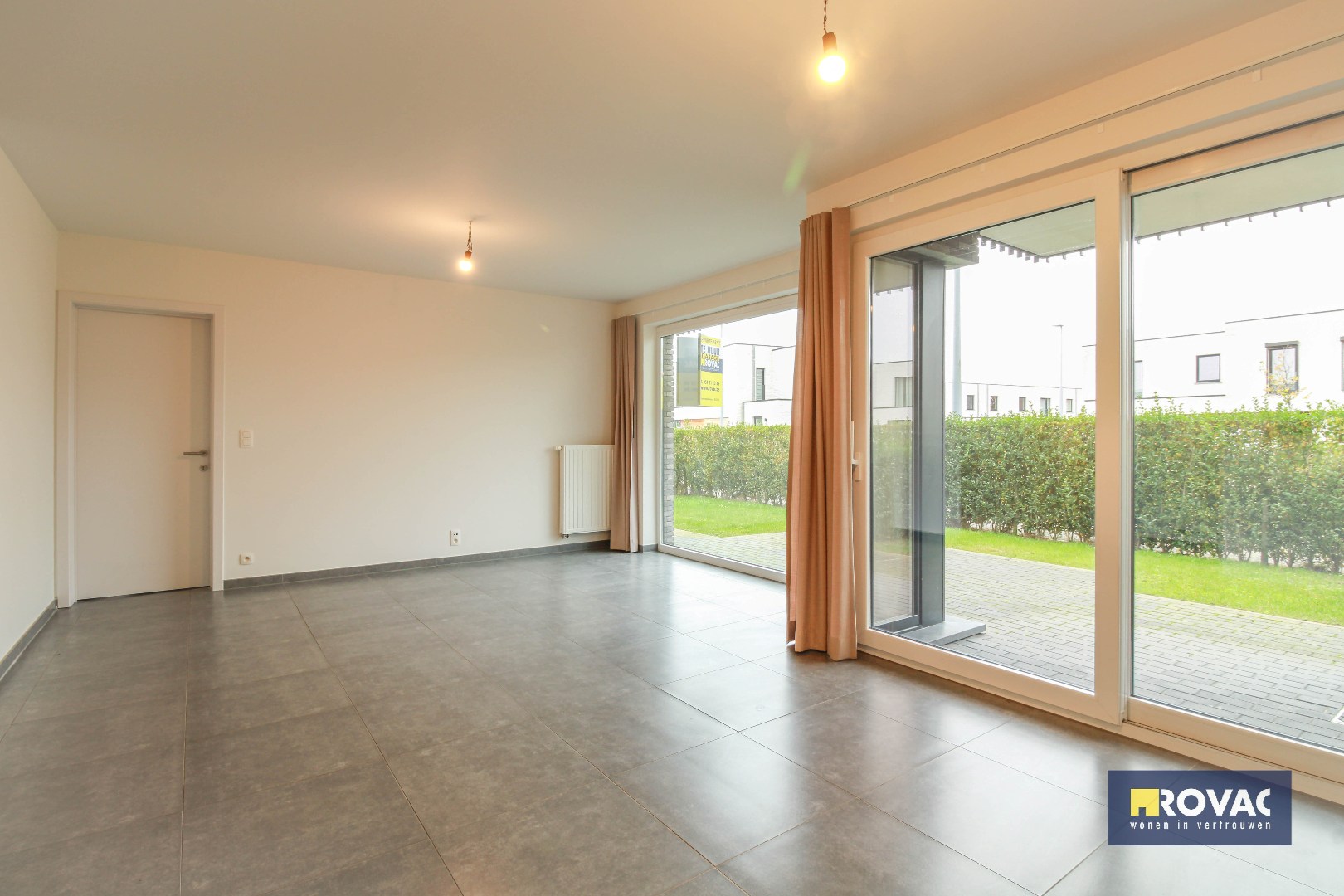 Gelijkvloers appartement met tuin en garage! - foto 4