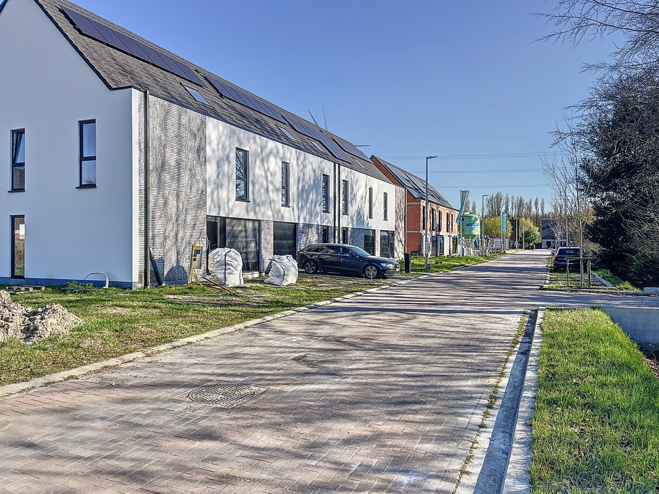 Halfopen bebouwing in opbouw met garage - foto 4