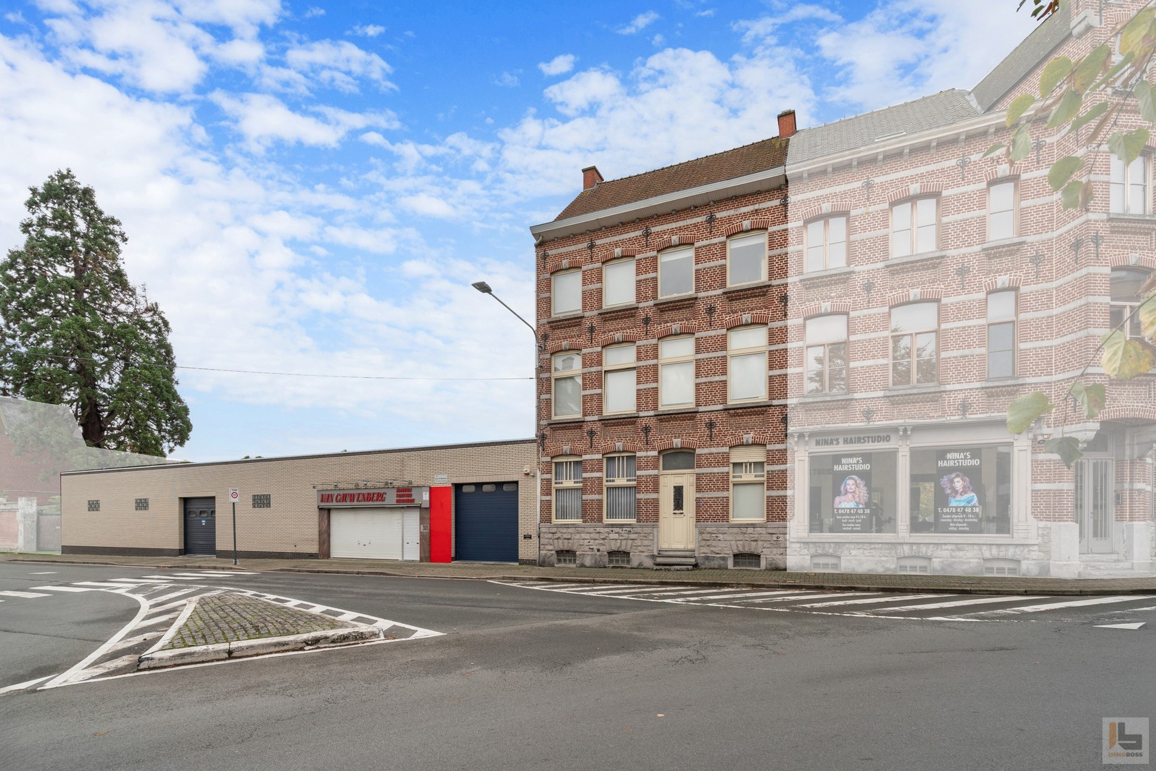Huis met handelszaak en groot magazijn. - photo 1