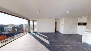 <strong>Beautiful new-build apartment with panoramic view</strong><br /><br />Located on the seventh floor of the Antwerp Tower, this apartment overlooks the city.<br /><br />360° video: <span>https://my.matterport.com/show/?m=DUHYfqSQnwi</span><br /><br />Spacious and bright living room and open kitchen with cooking island equipped with every comfort and usual appliances. Handy is the storage room next to the kitchen with connection for washing machine and dryer.<br />Cooking with a view of the city: it's possible here!<br />Furthermore two bedrooms, each with a view of the city and access to the terrace. Bathroom with walk-in shower and sink.<br />The spacious terrace is accessible from the living room and the bedrooms and is also South oriented.<br /><br />A large storage room is also located on the seventh floor.<br /><br />Possibility to rent a parking space at 200€ per month.<br /><br /><strong>In short, the ideal place to live for true lovers of the city!</strong>
