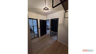 Een mooi afgewerkt appartement op de tweede verdieping bestaande uit een ruime woonkamer met open ingerichte keuken, 2 slaapkamers,...