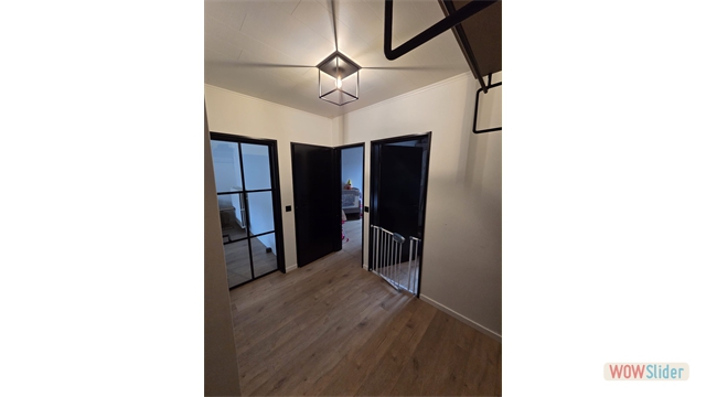 Een mooi afgewerkt appartement op de tweede verdieping in het centrum van Oostmalle - foto 2