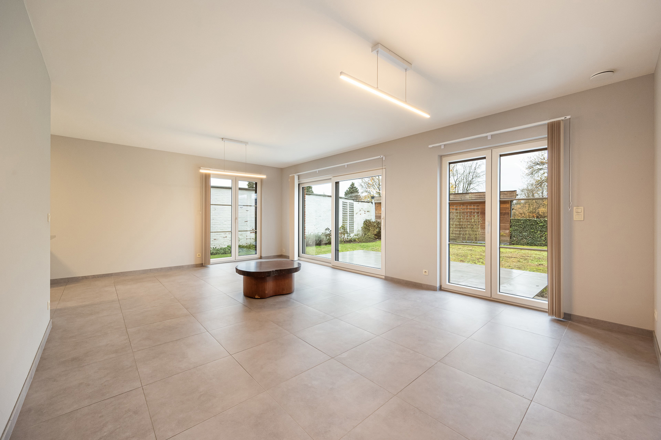 Recent gelijkvloers appartement van 80m² met 2 slks, tuin, garagebox, autostaanplaats en kelderberging. - foto 3