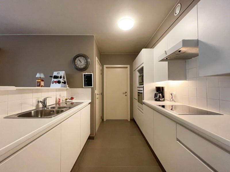 Modern appartement met 2 slaapkamers, terras en garage op centrale ligging te Wakken! - foto 4