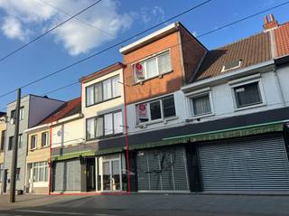 This commercial property with 2 apartments for sale in Deurne, at Herentalsebaan 231-233, offers many opportunities.The ground floor consists of 2 commercial spaces that can be merged.There is also an office space with a courtyard on the ground floor.At the back, we find a spacious basement with a warehouse and office on top.The two apartments have been completely renovated and are in very good condition. They are also currently rented out, which ensures consistent rental income. The apartments have a separate entrance on the side of the building. They also have separate cellars, where there is also a fuel oil tank, With this property for sale in Deurne, it is possible to merge numbers 231-233 with numbers 235-237. More information about this can of course be obtained from our team in Deurne.Are you interested in this property for sale in Deurne? Don't hesitate to contact us. Deurne's Dewaele real estate office on the Turnhoutsebaan is happy to be at your service. Would you like a free estimation of your property? call us for an informal conversation on 03/666.66.66 or mail to deurne@dewaele.comUrban planning information: on requestEPC Herentalsebaan 231:1022 kWh/(m² year F)EPC Herentalsebaan 233 GD: presentEPC Herentalsebaan 233 101:140 kWh/(m² year) BEPC Herentalsebaan 233 201:241 kWh/(m² year C)