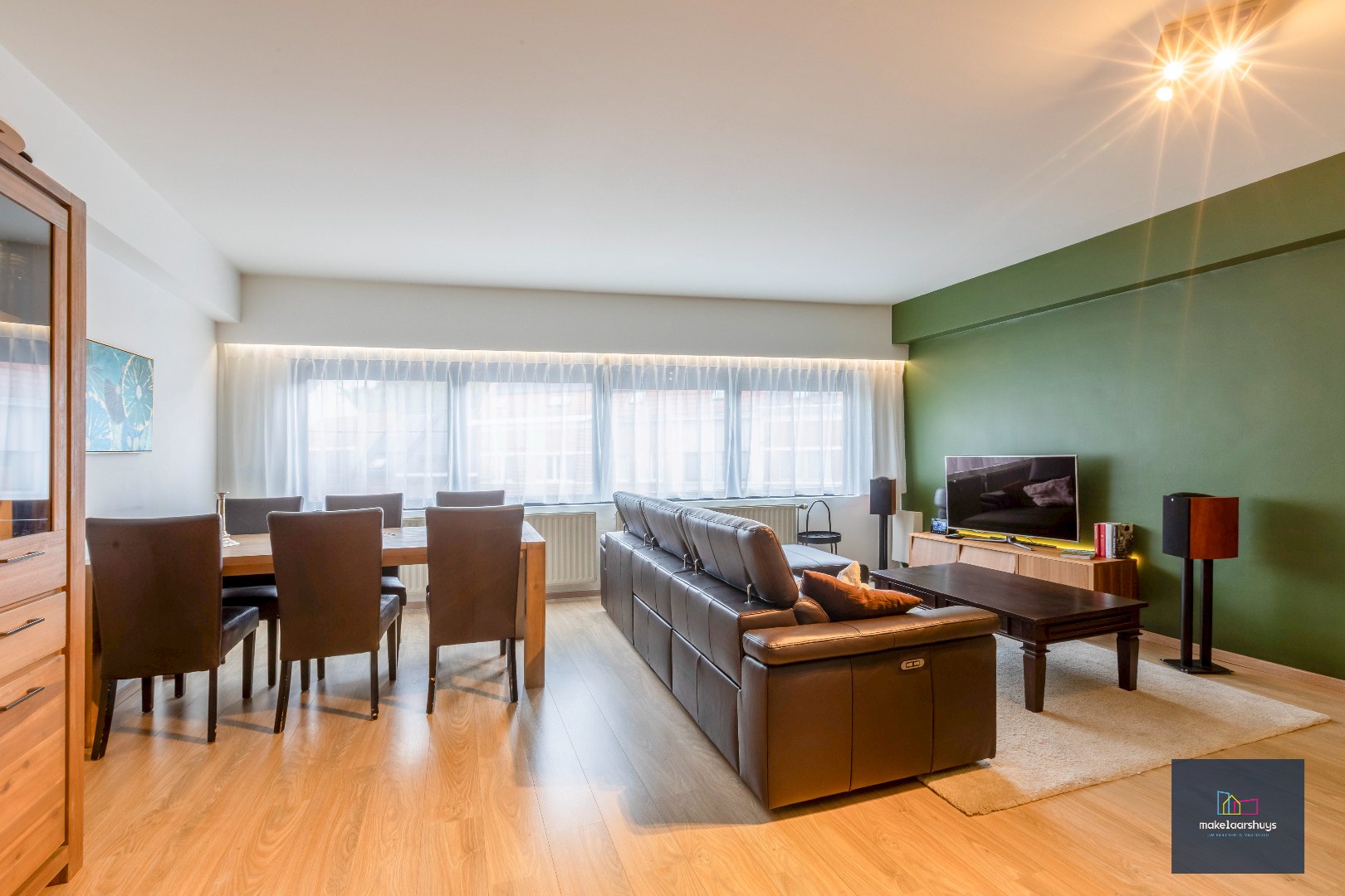 Heel ruime instapklare woning in rij met zonneterras en 2 staanplaatsen - foto 4