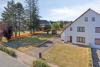 BOUWGROND VOOR OPEN BEBOUWING VAN 9A34CA TE HOUTHALEN-OOST!Deze bouwgrond, gekend als lot 1 van een goedgekeurde verkaveling is negen are...