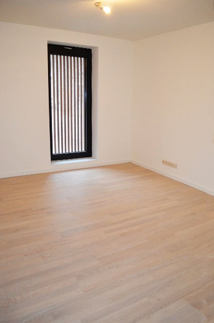 Gelijkvloers appartement met 2 slaapkamers, terras en tuin. - foto 4