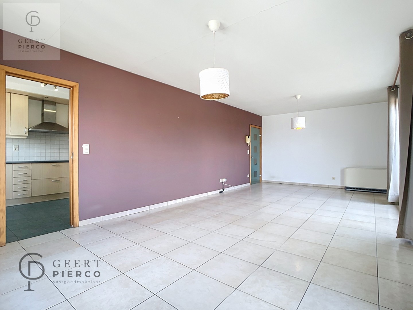 Ruim appartement met twee slaapkamers, kelder en ondergrondse staanplaats. - foto 3