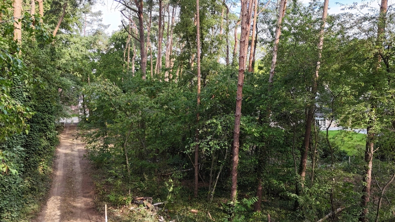 Residentieel gelegen bouwgrond van 15 are voor open bebouwing nabij golf- en meerdomein - foto 4