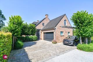 <p><span>Exclusive villa in a quiet location in Boortmeerbeek</span></p><p><span> </span></p><p><span>Do you dream of a luxurious, modern home in a quiet, green setting? This exclusive villa offers everything you’re looking for—and perhaps even more. Thanks to the recent renovations on the ground floor (2020) and the beautifully landscaped garden, you’ll feel as if you’re living in a brand-new home. In short, everything is here for you to lose yourself in a world of your own.</span></p><p><span> </span></p><p><span>Upon entering the foyer, you’ll immediately notice the stylish finishes and abundance of natural light. From the cozy living area with its sitting and dining sections, you can enjoy views of the fully landscaped garden. The open-concept kitchen is equipped with every luxury you could wish for. Adjacent to this is a spacious, practically organized storage room. The ground floor also features a spacious indoor garage.</span></p><p><span> </span></p><p><span>On the first floor, you’ll find three spacious bedrooms, with the master bedroom featuring access to a spacious walk-in closet. The bathroom includes a spacious shower, bathtub, and separate toilet.</span></p><p><span> </span></p><p><span>Outside, the villa offers everything you need for comfort and privacy. Enjoy the beautifully landscaped garden, the cozy terrace, or the covered terrace, where you can relax in complete peace. Optionally, you can even take over the lovely wood-fired hot tub.</span></p><p><span> </span></p><p><span>The driveway also has plenty of space for your cars.</span></p><p><span> </span></p><p><span>Additional highlights:</span></p><p><span> </span></p><ul><li><span>Underfloor heating on the ground floor (making it easy to switch to a heat pump)</span></li><li><span>Solar panels (with green energy certificates)</span></li><li><span>Rainwater cistern</span></li></ul><p><span> </span></p><p><span>This villa offers not only luxury but also a prime location: walking and biking trails just around the corner and excellent access to Leuven, Mechelen, Brussels, and Antwerp.</span></p><p><span> </span></p><p><span>Are you ready to discover luxury at its b'? Call us to schedule a viewing and come experience this villa for yourself!</span></p><p><span> </span></p><p><span>015 20 36 00 - <span>info@domoxim.be</span></span></p><p><span> </span></p><p><span>domoXim. Where dreams come home!</span></p><p><span> </span></p><p><span>Want to know the value of your </span><span>own</span><span> home? We’d be happy to advise you.</span></p>