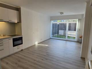 GEZELLIG GELIJKVLOERSAPPARTEMENT MET 1 SLAAPKAMER, GROOT ZUID-GEORIËNTEERD TERRAS 19M² EN GARAGE.rustige ligging nabij centrum met vlotte...