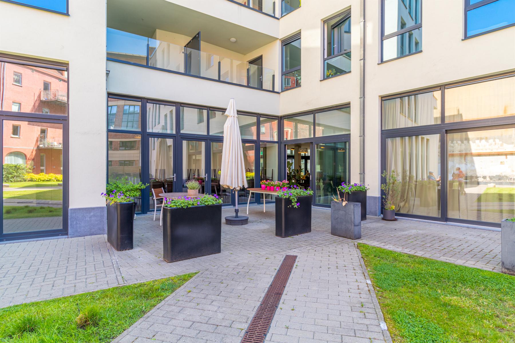 Handelsruimte met vast rendement in het centrum van Gent - foto 4