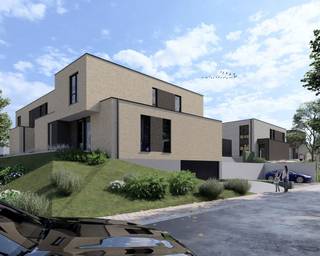 <strong>Woonoase Delvaux </strong><br />Energiezuinig nieuwbouwproject in groene en rustige straat – Neerijse<br /><br />AANKOOP MOGELIJK AAN 6% BTW<br /><br />Op de hoek van Wolfshaegen met de rustige Ridderstraat wordt dit kleinschalige en kwalitatieve nieuwbouwproject van 10 woningen gerealiseerd. <strong>Omgeven door groen</strong>, biedt dit project een ideale combinatie van wooncomfort, duurzaamheid en levenskwaliteit.<br /><br />Het project bestaat uit een gevarieerde mix van <strong>open, halfopen en gesloten bebouwingen</strong>, geschikt voor gezinnen en koppels die op zoek zijn naar een moderne en toekomstgerichte woning.<br /><br />Alle woningen worden uitgerust met <strong>hedendaagse technieken en een sterke focus op energiezuinigheid</strong>:<br />- E-peil lager dan of gelijk aan 10 <br />- Lucht-water warmtepomp<br />- Vloerverwarming<br />- Volledig onderkelderd, ideaal als extra bergruimte of multifunctionele ruimte<br /><br />Dankzij deze duurzame voorzieningen geniet u van een aangenaam binnenklimaat en <strong>lage energiekosten</strong>. De groene en rustige ligging zorgt voor een aangename woonomgeving, met <strong>vlotte verbindingen</strong> naar omliggende gemeenten en dagelijkse voorzieningen.<br /><br />Tot slot: doordat de <strong>tuinaanleg is inbegrepen</strong> in de prijs, kunt u al meteen heerlijk genieten van de <span><strong>zuid-georiënteerde </strong>tuin wanneer u de sleutels ontvangt. <br /></span><br />Een aantrekkelijk nieuwbouwproject voor wie rustig, comfortabel en energiezuinig wil wonen in het groen.<br /><br />Interesse? Neem snel met ons contact op.