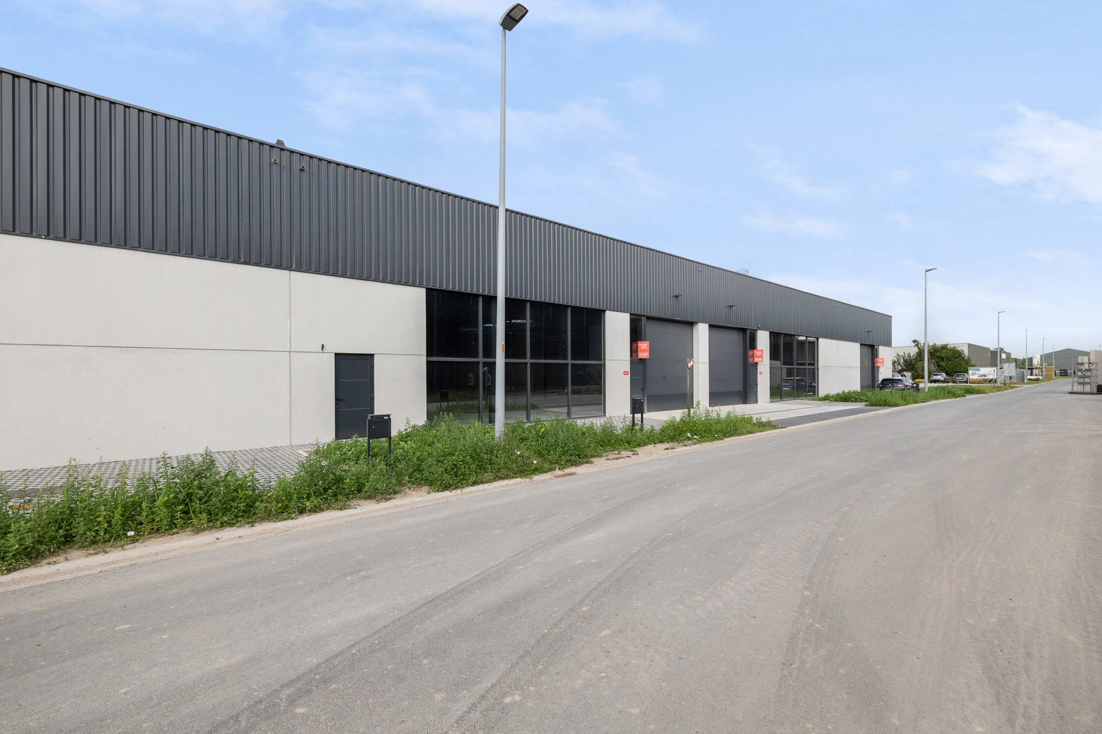 Flexibele werkunit nabij op- en afrit van de E40 met een opp van 778m2! - foto 1