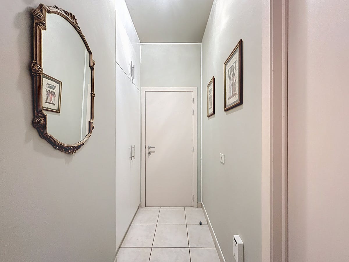 Ground floor 2-bedroom apartment with garage box near the center of Aalter - photo 4