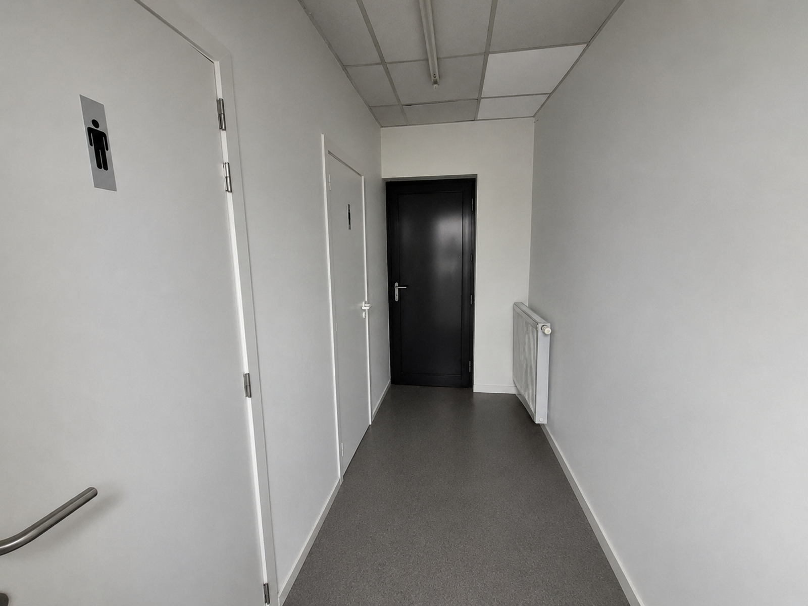 Commercieel pand met uitstekende ligging in winkelstraat - foto 4