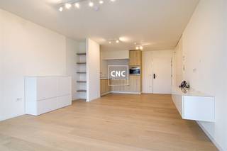 Fully finished service flat in Residence Cypres - Knokke.Residentie Cypres is a stylish and luxurious residence, quietly located amidst the greenery, near the Cultural Center Scharpoord and within walking distance of the center and the Lippenslaan. The building was designed with attention to comfort, independence and customized care, making it an ideal living environment for those who love peace and quiet while desiring proximity to the vibrant heart of Knokke.Layout: This pleasant service apartment has a bright living room that opens onto a sunny terrace with an open view of the villas. There is a full bedroom, a fitted kitchen and a bathroom with walk-in shower, washbasin and toilet. The apartment also includes a private basement storage room and two bicycle spaces. In addition, there is the possibility of purchasing a spacious garage box in the building.What makes this property extra special are the communal amenities offered by the residence. Residents can enjoy a restaurant, a lounge and library, a hair salon, a fitness and kiné room and a beautiful garden with a terrace. Everything is designed to combine comfort and independence with a touch of luxury, in a green and quiet environment close to all amenities.Would you like additional information or to schedule a visit? Contact Nathalie Colpaert at 0495/62 18 81 or via mail info@immocnc.be.