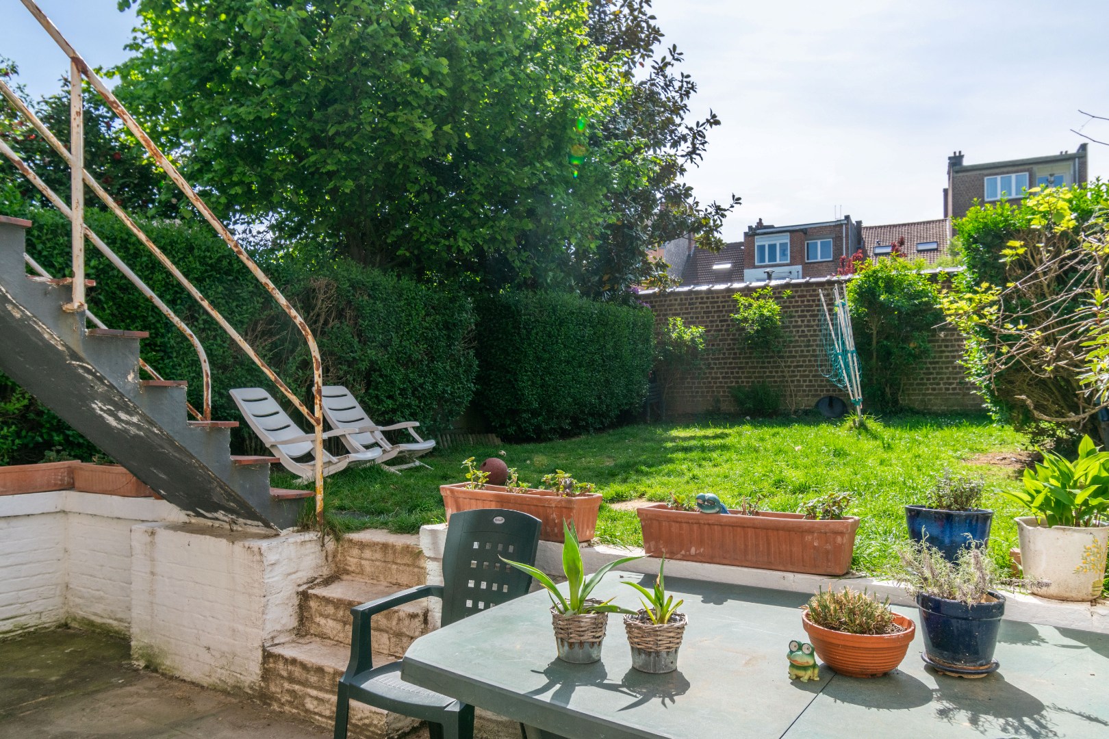 Een opbrengsteigendom bestaande uit 2 appartementen, garage en tuin. - foto 3