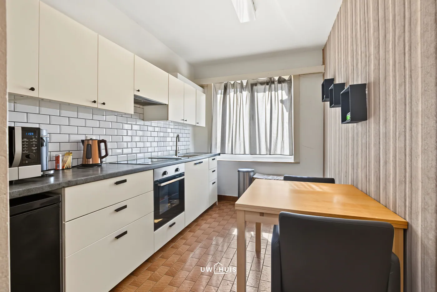 Ruim 2 slaapkamer appartement met garage in centrum Verrebroek - foto 5