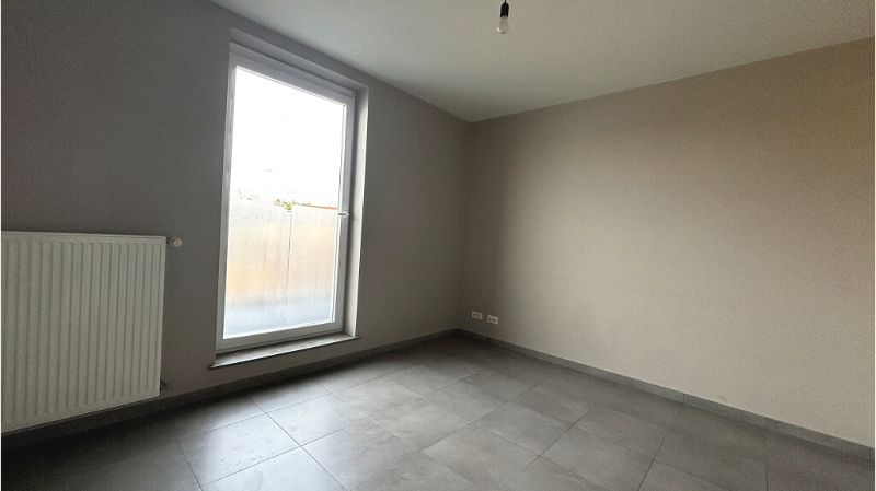 Instapklaar 1-slaapkamerappartement met TERRAS en AUTOSTANDPLAATS te huur in Torhout - foto 4