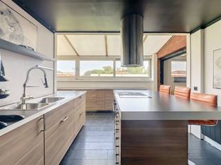 <p>Welcome to this exceptionally spacious home, centrally located and offering a wealth of possibilities. The home features several full floors, spacious living areas, and no fewer than 4 bedrooms, with the potential to create additional rooms or functional spaces.</p><p>On the ground floor, there is a very spacious garage/storage area, suitable for multiple cars, storage, a hobby room, or possibly a combination of living and working spaces. This makes the property particularly appealing for those seeking extra space or practical solutions at home.</p><p>The home includes, among other features, a light-filled living area, a spacious kitchen, multiple bathrooms, bedrooms, and a large attic that can be further customized to your liking. Thanks to the 36 solar panels on the property, the home also offers a significant energy advantage.</p><p>Although the home could use some refreshing or finishing touches in certain areas, it offers, above all, exceptional space and potential.</p><p>Are you looking for a spacious home with a garage, storage options, and potential for expansion? Then this property is definitely worth a visit.<br />For more information or to schedule a visit, email info@property-vastgoed.be</p>