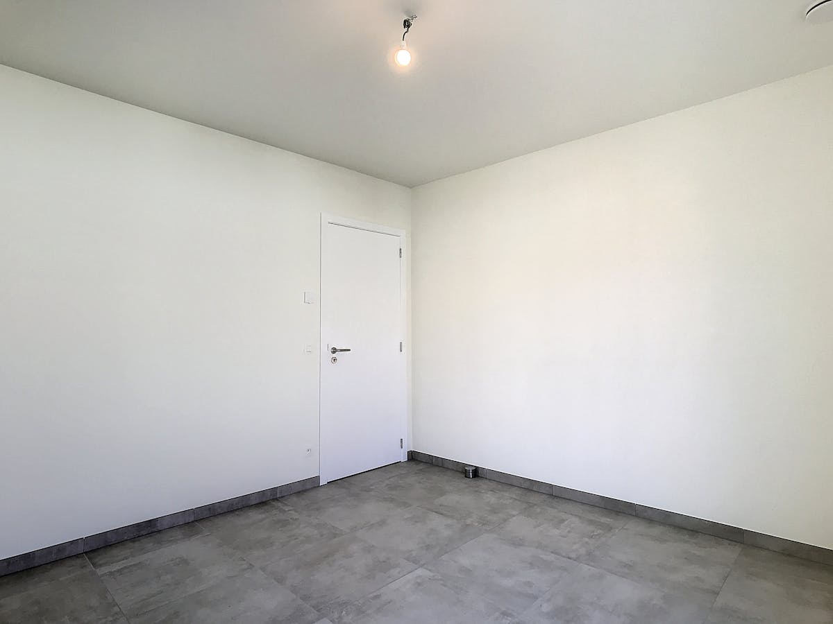 Newly built ground floor apartment with garden for rent in Edegem - photo 5